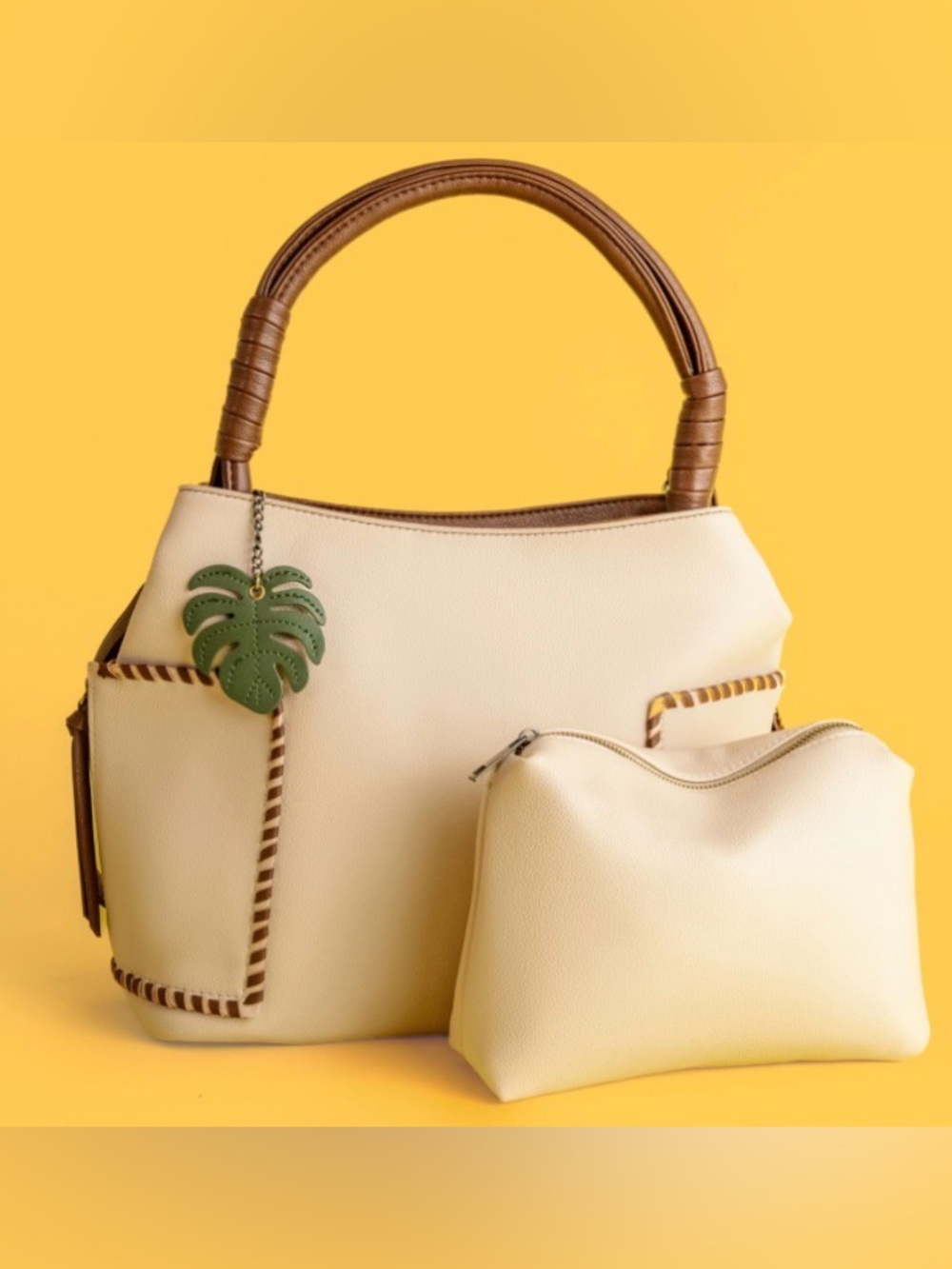 NWT. Malibu Skye Cream Hobo Bag with Brown Handles & Green Leaf Charm